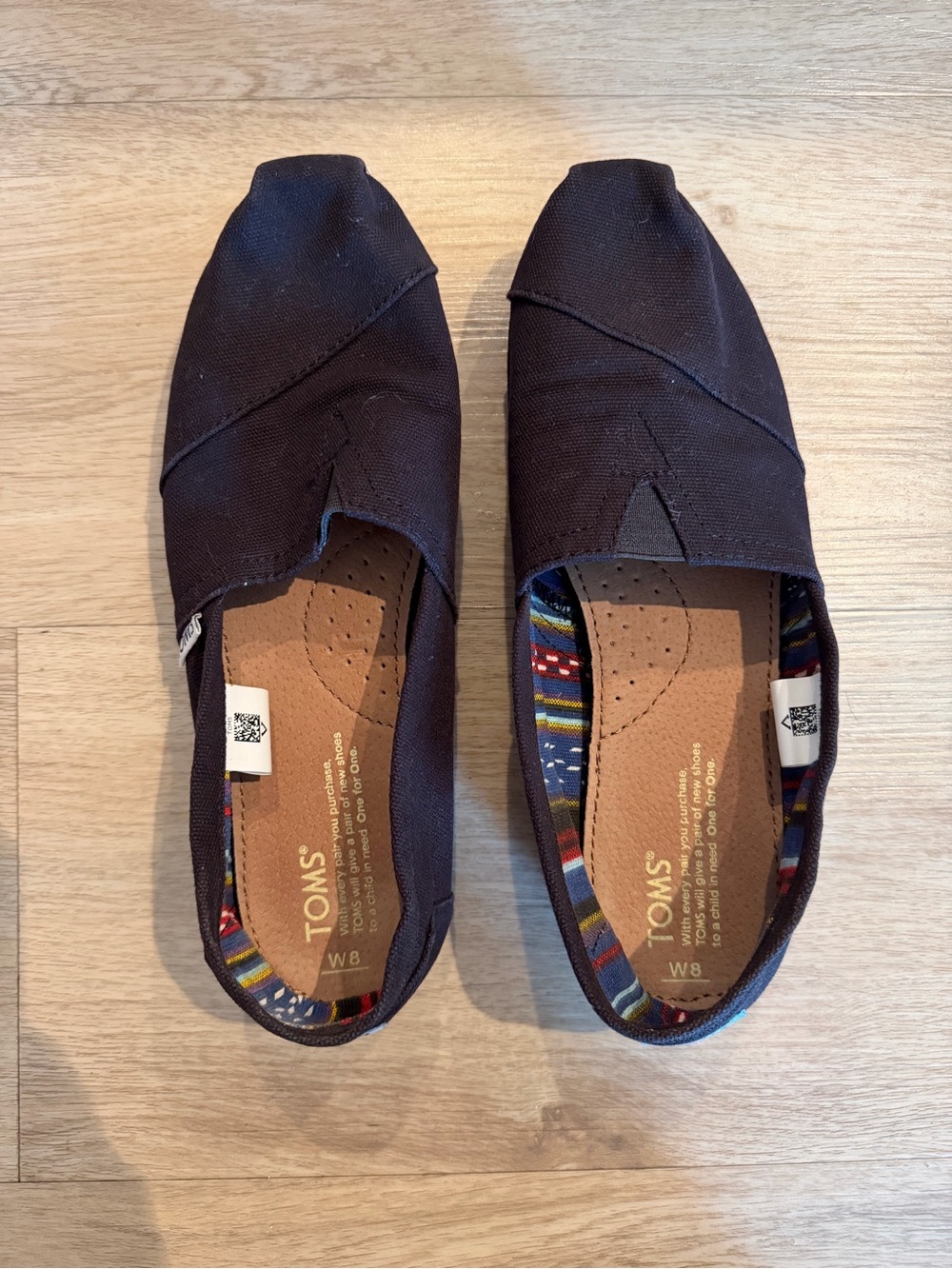 TOMS Classic Canvas Slip-Ons in black
